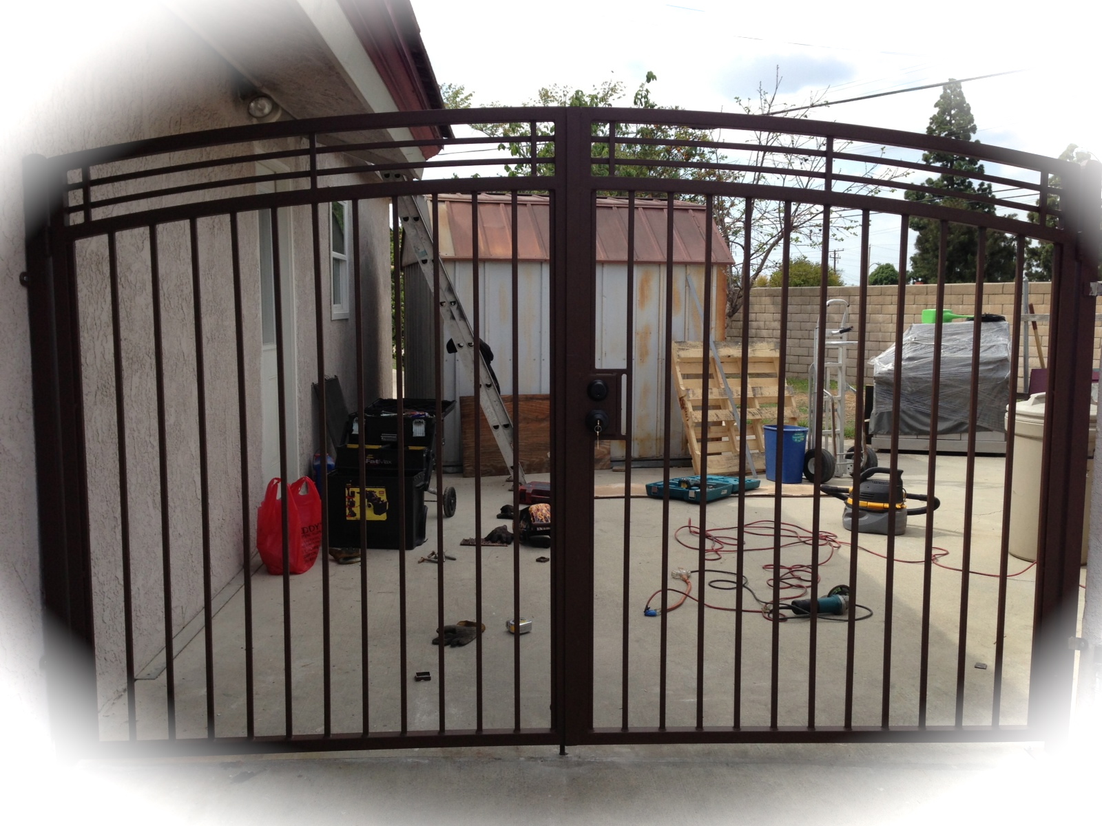 Driveway gate arch cross hatch open bar